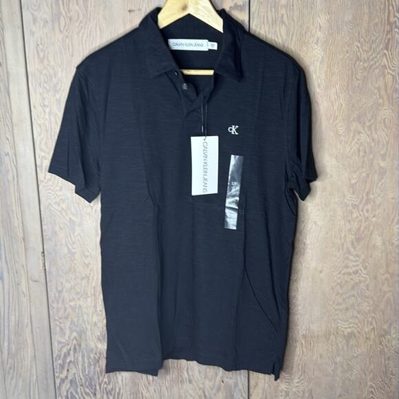 NWT Calvin Klein Jeans Black With White Logo Polo Shirt Size Small - Picture 1 of 5